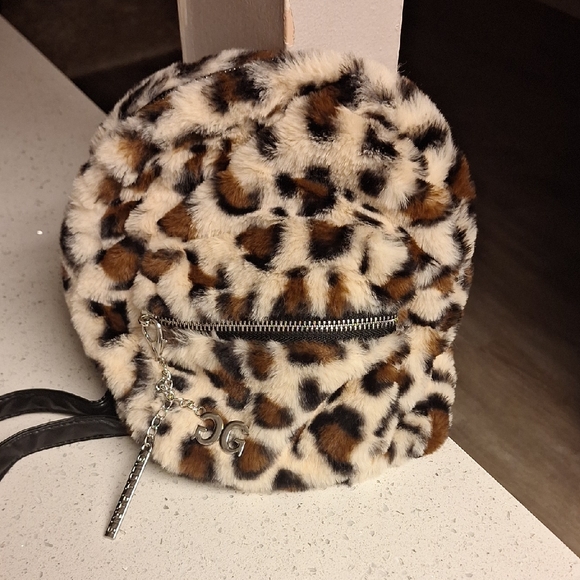 Gilda Paris Accessories - NWOT Gilda Paris Leopard Print Faux Fur Mini Backpack.